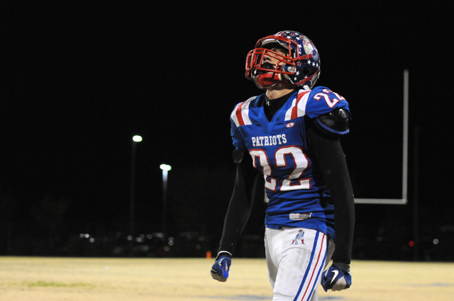 Patriots wide receiver Deseon Mcquaig (22) reacts after a dropped pass against Canyon Springs during the Sunrise Region semifinal game at home in Henderson, Friday, Nov. 15, 2013. The Liberty Patr ...