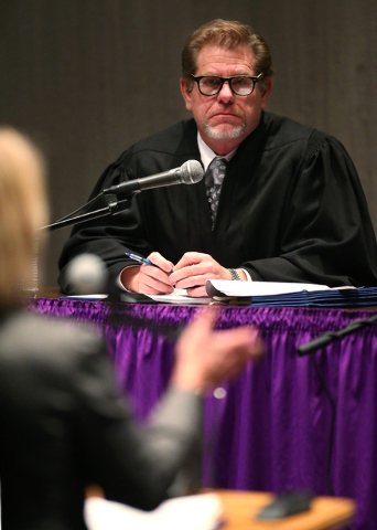 Justice Ron Parraguirre listens as attorney Kristine Brown argues before a Supreme Court panel at the Jeanne Dini Cultural Center in Yerington on Thursday. The panel met in Yerington as part of an ...
