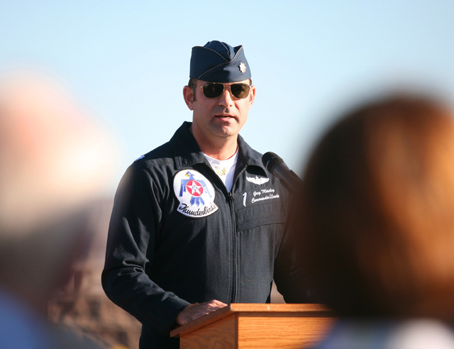 Lt. Col. Greg Moseley (CQ) speaks during a rededication ceremony for Capt. Gene Devlin outside the Thunderbirds Hangar at Nellis Air Force Base Friday, Nov. 15, 2013, in Las Vegas. A one-twelfth s ...