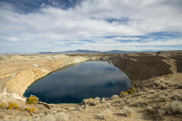 A water-filled mine pit at the former Anaconda copper mine site near Yerington tested as high as 100 times above the legal drinking water standard for uranium or arsenic or both. (AP Photo/Scott S ...