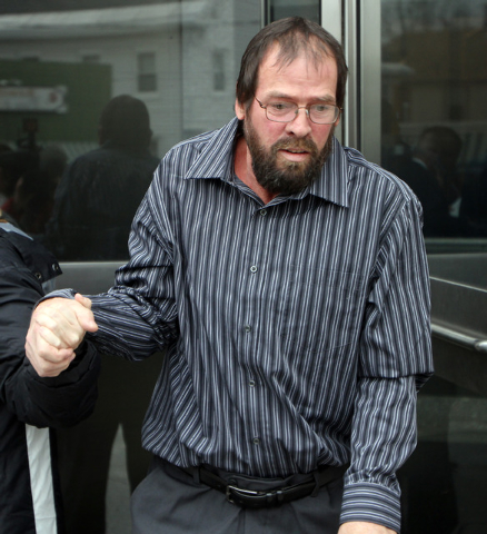 Donald Page, who was infected with hepatitis C at the Exeter,N.H. hospital, leaves U.S. District Court in Concord, N.H., Monday Dec. 2, 2013 after testifying against David Kwiatkowski, a medical t ...
