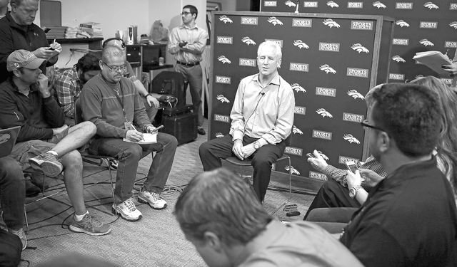 Denver Broncos head football coach John Fox speaks at a news conference at the NFL team's headquarters in Englewood, Colo. on Monday. Fox returned to work on Monday for the first time since having ...
