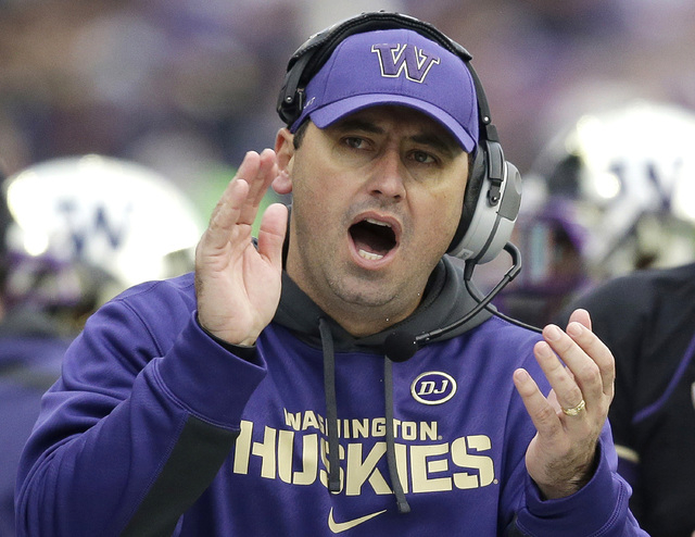 FILE - In this Nov. 29, 2013 file photo, Washington head coach Steve Sarkisian yells from the sidelines in the second half of an NCAA college football game against Washington State in Seattle. Sar ...
