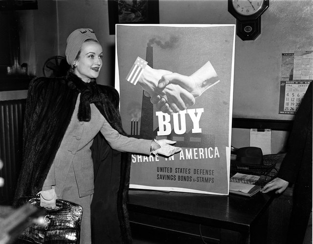 Actress Carole Lombard is seen rehearsing her role in selling defense bonds and stamps on Jan. 14, 1942, in Chicago. Lombard died in a plane crash on Mount Potosi, southwest of Las Vegas, on Jan.  ...