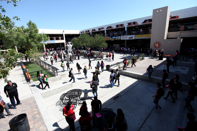 Chaparral High School students hurry between classes on the first day of school in Las Vegas on Aug. 29, 2011. Chaparral is one of the five high schools being cleaned in the wake of last week’s ...