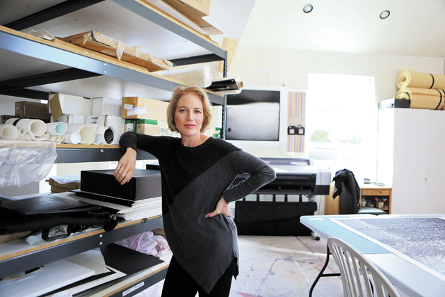 Linda Alterwitz stands in her home studio Nov. 26, 2013, in Las Vegas. Alterwitz is a visual artist skilled in photography, digital work and painting who recently was the recipient of a $5,000 fel ...