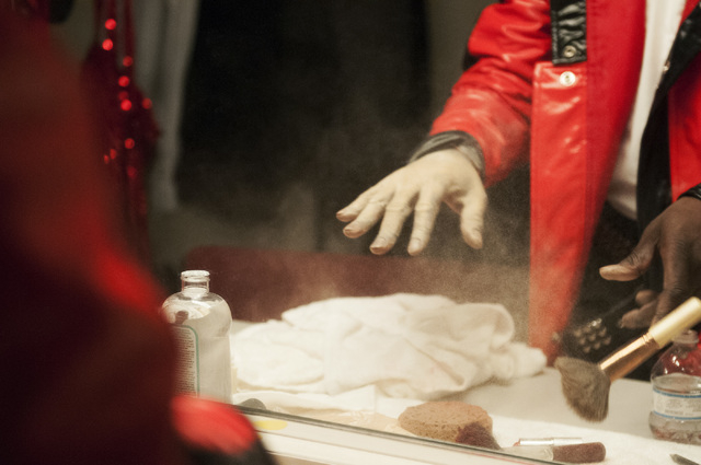 Sean E. Cooper does his make up backstage before entertaining the crowd with his Michael Jackson impression during his show at Sin City Theatre inside Planet Hollywood hotel-casino in Las Vegas, S ...