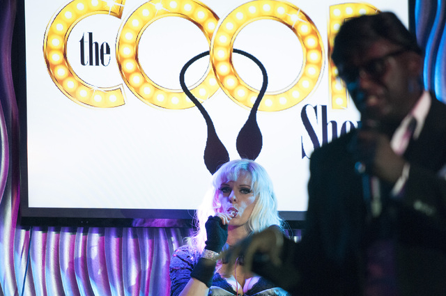 Sean E. Cooper, right, performs a song during his show with Dar Brzezinski at Sin City Theatre inside Planet Hollywood hotel-casino in Las Vegas, Saturday, Dec. 7, 2013. (Erik Verduzco/Las Vegas R ...