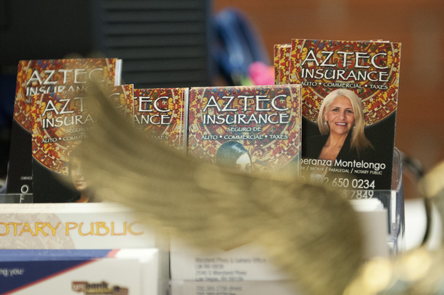The business card of Esperanza Montelongo, owner of Aztec Insurance, is seen at her office in Las Vegas Saturday, Dec. 28, 2013. (Erik Verduzco/Las Vegas Review-Journal)