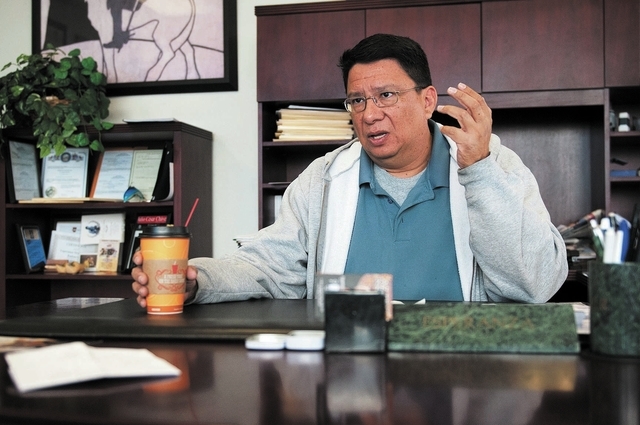Attorney Alfonso Garcia speaks about the Nevada driver authorization cards during an interview at Aztec Insurance in Las Vegas Saturday, Dec. 28, 2013. Nevada will begin to issue driver authorizat ...
