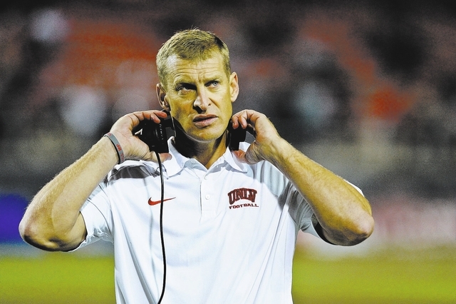 UNLV head coach Bobby Hauck looks on during a football game against Utah State at Sam Boyd Stadium in Las Vegas Saturday, Nov. 9, 2013. (David Cleveland/Las Vegas Review-Journal)