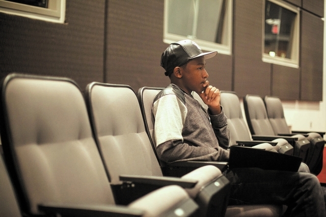 Fifteen-year-old UNLV student Ke'Andre Blackston Jr. listens as students take turns performing in Musical Theater class at the Paul Harris Theatre on the UNLV campus in Las Vegas Wednesday, Nov. 2 ...