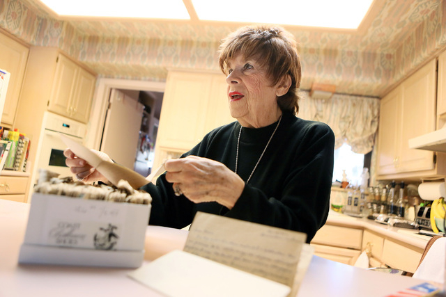 Fern Jennings, 83, sits in her kitchen with a box of her husband’s 70-year-old letters Wednesday, Dec. 11, 2013, in Las Vegas. Jennings came across the hand-written letters after her World  ...