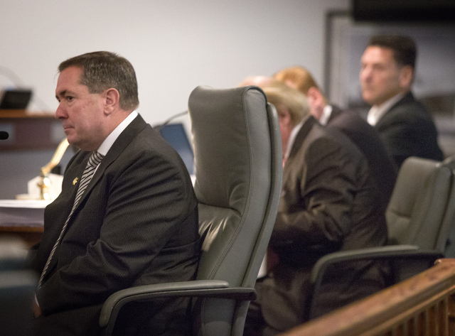 Former Clark County District Attorney David Roger, left, testifies during a Nevada Commission on Judicial Discipline hearing for suspended Family Court Judge Steven Jones on Monday. On the far rig ...