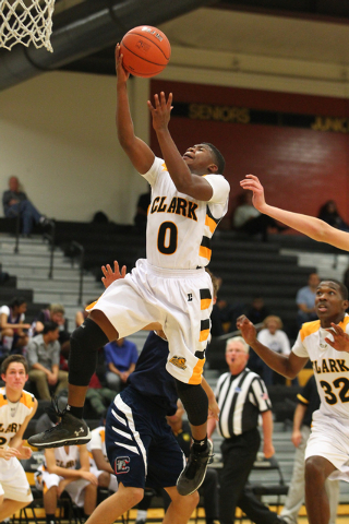 Clark's Colby Jackson (0) goes for a shot against Coronado during a basketball game at Clark High School in Las Vegas on Monday, Dec. 2, 2013. (Chase Stevens/Las Vegas Review-Journal)