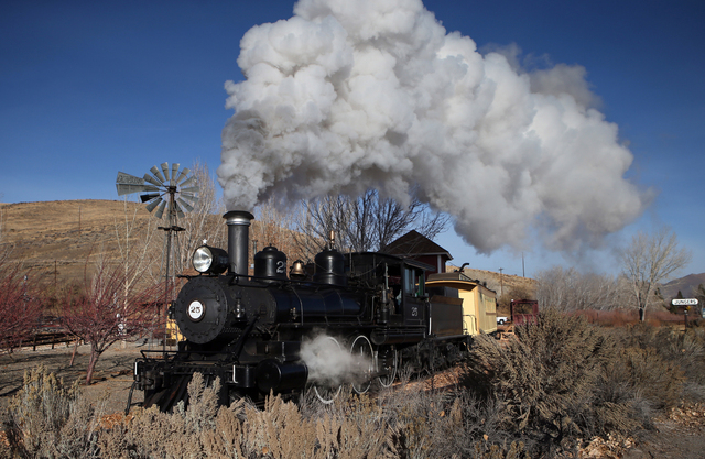 The Nevada State Railroad Museum runs the annual Santa Train with Locomotive No. 25 in Carson City, Nev., Sunday, Dec. 1, 2013. The engine, built in 1905, was initially purchased by the Virginia & ...