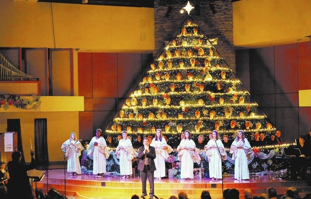 A choir sings during last year's performance of "The Living Christmas Tree" at the Community Lutheran Church, 3720 E. Tropicana Ave. This year's performance is scheduled for 7 p.m. Dec. 5-7 and 2  ...