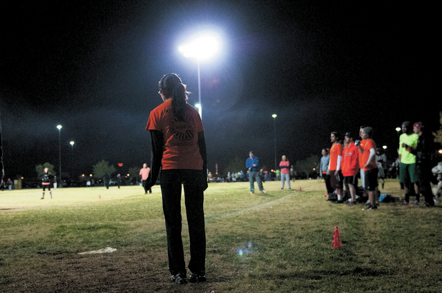 A kickball player with Cream Team gets ready to kick the all during a game against Kick'er & Lick'er at Desert Breeze Park in Las Vegas, Wednesday, Nov. 20, 2013. (Erik Verduzco/Las Vegas Review-J ...