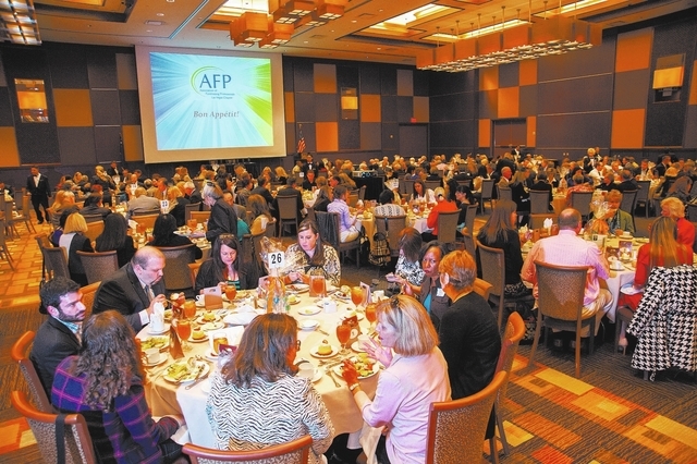 Guests enjoy lunch during the Association of Fundraising Professionals 22nd Annual National Philanthropy Day Awards Luncheon at the Golden Nugget hotel-casino in Las Vegas on Nov. 19, 2013. (Marti ...