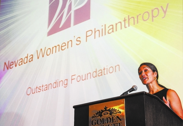 Naz Ford, President Nevada Women's Philanthropy speaks after receiving the award for Outstanding Foundation during the Association of Fundraising Professionals 22nd Annual National Philanthropy Da ...