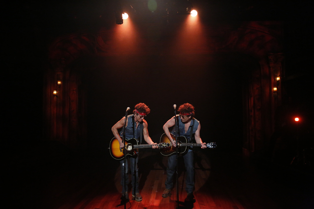 This image released by NBC shows Bruce Springsteen, left, and Jimmy Fallon performing during "Late Night with Jimmy Fallon," on Tuesday, Jan. 14, 2014 in New York. (AP Photo/NBC, Lloyd B ...