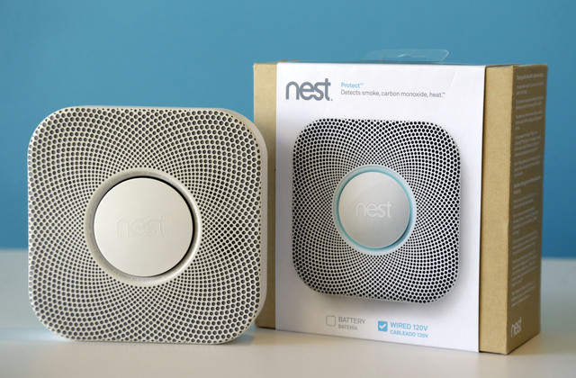 The Nest Labs smoke and carbon monoxide alarm is shown at the company's offices in Palo Alto, Calif. Google said Monday it will pay $3.2 billion to buy Nest Labs, which develops high-tech versions ...