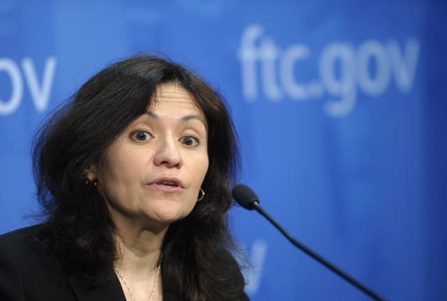 Federal Trade Commission (FTC) Chair Edith Ramirez speaks at the FTC in Washington, Wednesday, Jan. 15, 2014, where she announced Apple will refund $32.5 million to consumers to settle a federal c ...