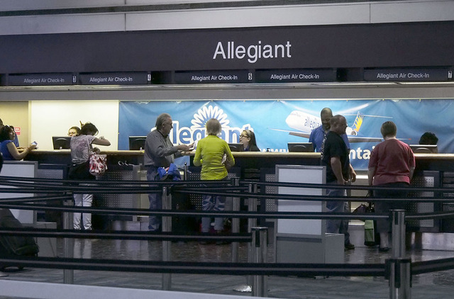 Passengers line up at the Allegiant Air ticketing counter at McCarran International Airport in Las Vegas. (Jerry Henkel/Las Vegas Review-Journal File Photo)