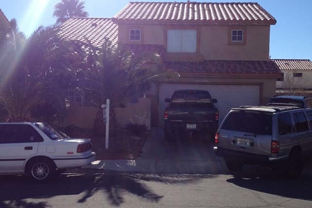 North Las Vegas police responded to a call at 2039 Cardigan Avenue Tuesday night, Jan. 14, 2014. A 49-year-old man was found dead inside the home, which is near Gowan Road and Clayton Street. (Ste ...