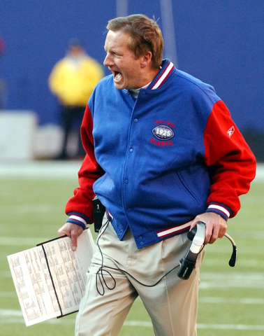 New York Giants coach Jim Fassel reacts after the officials called a personal foul penalty during the second quarter Sunday, Nov. 30, 2003, at Giants Stadium in East Rutherford, N.J. The Buffalo B ...
