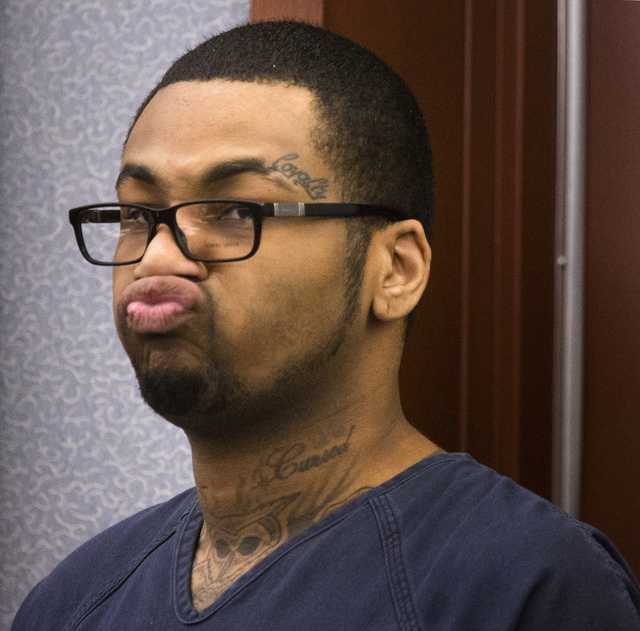 Ammar Harris throws a kiss to his girlfriend during his appearance in Clark County District Court on Wednesday before District Court Judge Kathleen Delaney. (Jeff Scheid/Las Vegas Review-Journal)