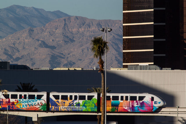 The Las Vegas Monorail heads northbound from the Harrahs Las Vegas and The Quad station towards the Las Vegas Convention Center station on Wednesday. (Chase Stevens/Las Vegas Review-Journal)