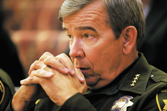 Sheriff Doug Gillespie sits in the audience in the Clark County Commission Chambers in Las Vegas Tuesday, Jan. 21, 2014. The commission held public hearings on a tax increase to fund more police o ...