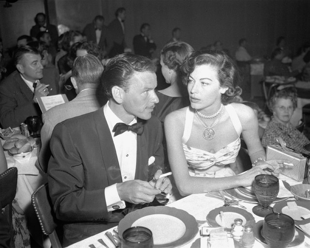 Singer Frank Sinatra and Ava Gardner dine together at Reno's Riverside Hotel, August 19, 1951, where Sinatra is filling a singing engagement while fulfilling the six weeks residence requirement fo ...