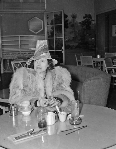 Helping to while away the six weeks she must wait before being able to file her suit for divorce against film actor Clark Gable, Mrs. Maria Gable is seen as she paid a visit to a Las Vegas, Nev., ...
