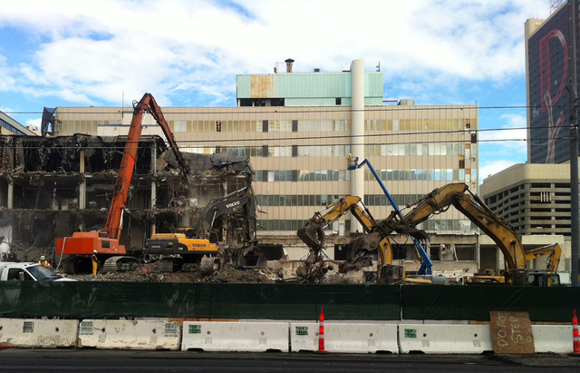 Construction crews on Friday, Jan. 31, 2014 use heavy machinery to rip down floors of the old Clark County Courthouse located at 200 S. Third St. in downtown Las Vegas. Derek Stevens, CEO of the D ...