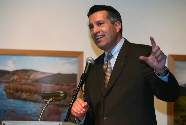 Gov. Brian Sandoval speaks at the grand opening event for the "Finding Fremont: Pathfinder of the West" exhibit at the Nevada State Museum, in Carson City, Nev., on Wednesday, Jan. 29, 2 ...