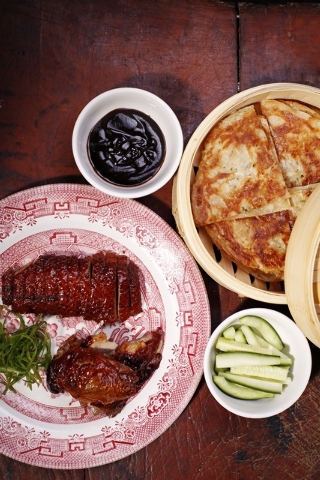 Peking duck dinner, Poppy Den Asian Bistro: Peking duck, marinated for three days in ginger, scallions, cinnamon, coriander and star anise, is the highlight of the five-course menu, available Frid ...