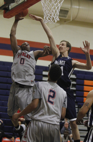 Findlay Prep's Horace Spencer (0) goes to the hoop against Impact Academy's Nate Pollard (21) at Bishop Gorman in Las Vegas on Saturday, Jan. 11, 2014. (Jason Bean/Las Vegas Review-Journal)