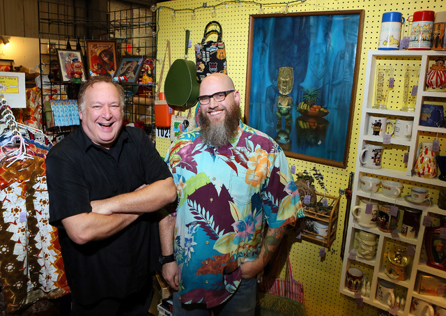 Jason T. Smith, left, and Bryan Goodman stand among merchandise at Sin City Pickers Antique Mall. The duo, which owns a booth at the shop, will make their television debut in the new reality show  ...