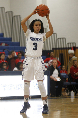 Canyon Springs senior guard Cherise Beynon (3) looks to pass while taking on Valley on Tuesday night. The Pioneers are 73-19 overall and 42-1 in Northwest League play since she joined the program  ...