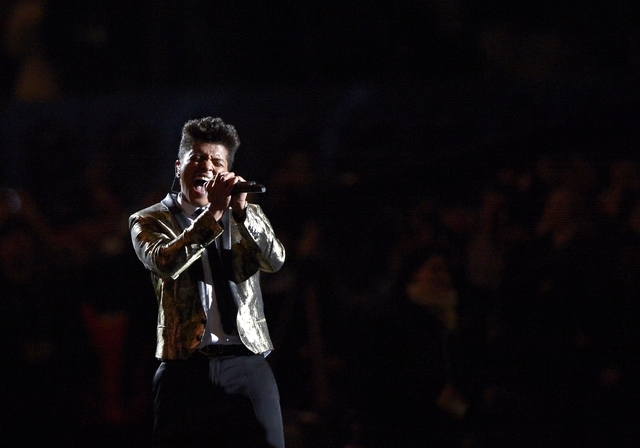 Bruno Mars performs during the halftime show of Super Bowl XLVIII on Sunday. On Feb. 16, Mars returns to The Cosmopoilitan of Las Vegas where he began his first Las Vegas headliner residency when  ...