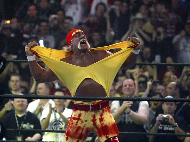 Hulk Hogan fires up the crowd between matches during WrestleMania 21 in Los Angeles. Hogan, perhaps the biggest star in WWE's 50-year history, is set to bring the red-and-yellow back to the sports ...