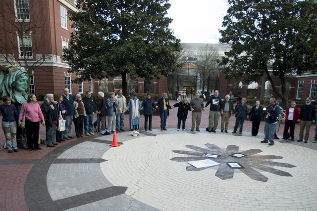Supporters of Sister Megan Rice, Michael Walli, and Greg Boertje-Obed gather outside after the three were sentenced for their roles in a July 2012 break-in at the Y-12 National Security Complex in ...