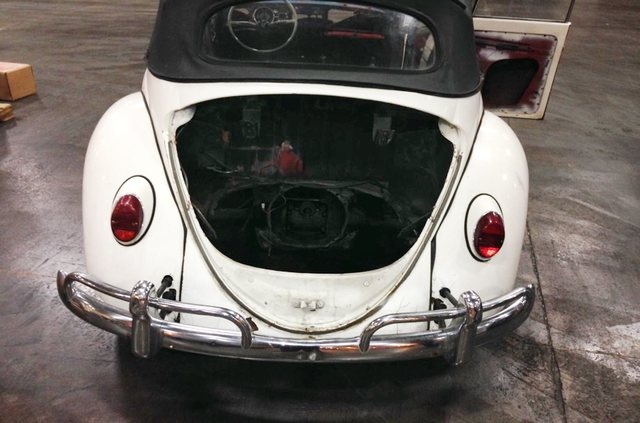 In a handout photo provided by the Customs and Border Protection, a 1965 Volkswagen Beetle stolen 40 years ago in Tennessee is seen in Detroit. Federal agents making a routine check of the cars pa ...