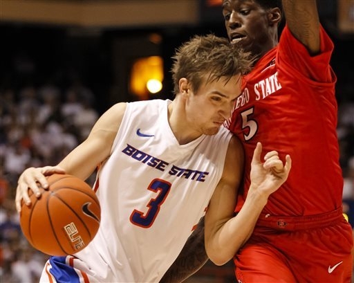 Boise State's Anthony Drmic drives the ball against San Diego State's Dwayne Polee II  during a game in Boise, Idaho, on Feb. 5. (AP Photo/Otto Kitsinger)