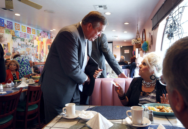 Assemblyman Cresent Hardy, R-District 19, greets Patricia Martinelli-Price at the Hispanics in Politics at Dona Maria Tamales restaurant in Las Vegas on Wednesday. Hardy is running in the Congress ...