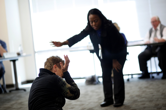 Jamie DeCarlo, left, acts as an inmate in crisis during crisis intervention training for Southern Nevada corrections officers in Las Vegas March 1, 2013. A 2013 Review-Journal detailed the story o ...