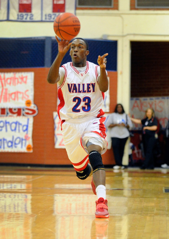 Valley’s Nick Brannon brings the ball down court on Wednesday against Canyon Springs. ...