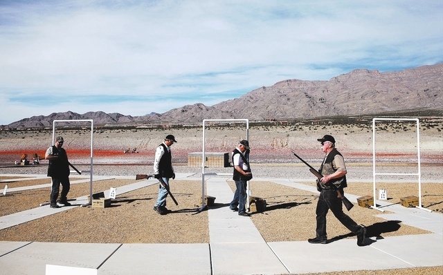 People take part in a Ducks Unlimited shooting event at the Clark County Shooting Complex in Las Vegas Thursday, Feb. 20, 2014. (John Locher/Las Vegas Review-Journal)